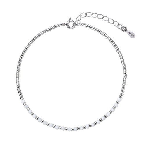 Strieborný náramok s howlitmi