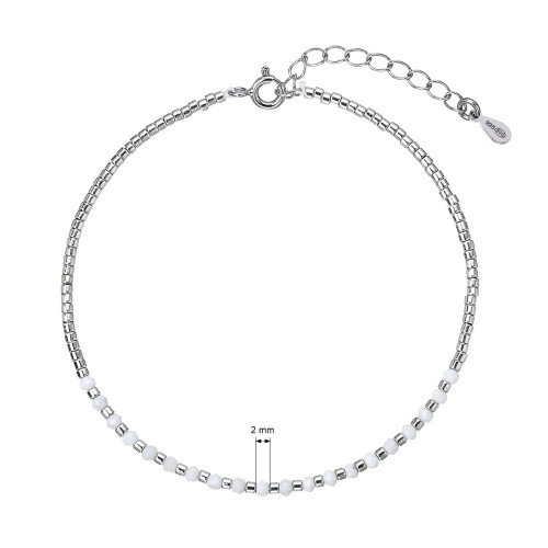 Strieborný náramok s howlitmi